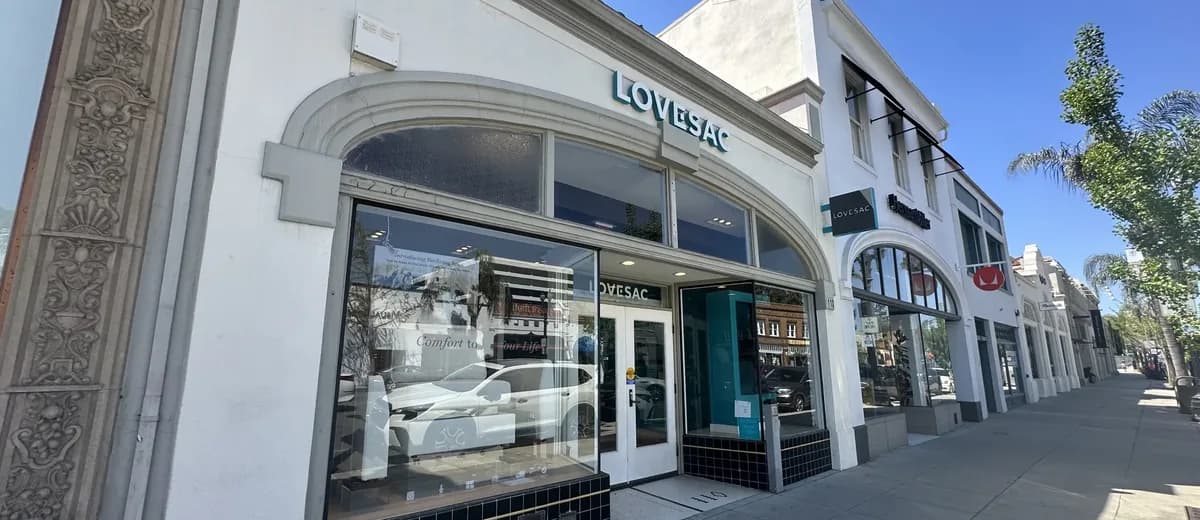 A street-level retail storefront on a commercial block